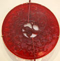 Red glass disc at Royal Ontario Museum. Toronto, ON.