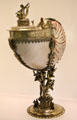 Nautilus shell cup in gilded silver mount in form of tree stem with figures of Neptune, child & animals from Northern German at Art Gallery of Ontario. Toronto, ON.