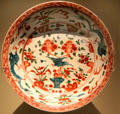 Porcelain Swatow ware dish painted with blue dragons & red flowers from China at Montreal Museum of Fine Arts. Montreal, QC.