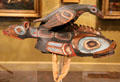 Kaigani Haida or Tlingit crest dance helmet with raven on fish from Alaska at Montreal Museum of Fine Arts. Montreal, QC.