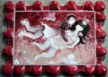 Meissen Porcelain plaque in red lovers in clouds by Heinz Werner at Meissen factory. Meissen, Germany.
