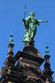 St Catharina statue atop small tower on Hamburg City Hall. Hamburg, Germany.