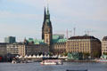 Lake Alster market & Hamburg City Hall tower. Hamburg, Germany