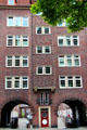 Entrance between archways to unit in brick building at Steinstraße & Mohlenhofstraße. Hamburg, Germany