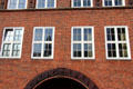Detail of heritage brick warehouse building in old canal district. Hamburg, Germany.