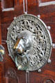 Bronze lion head door pull on entrance to St Peter's Church. Hamburg, Germany.