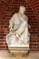 Statue of Evangelist, St Mark, with his attribute lion, at entrance to St Peter's Church. Hamburg, Germany.