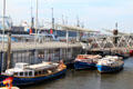 Tour boats docked at St Pauli Pier. Hamburg, Germany.
