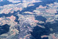 Aerial view of village, fields & forest on approach to Frankfort am Main. Germany.