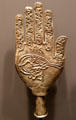 Muslim metal finial in shape of hand with calligraphy from Karachi, Pakistan at Five Continents Museum. Munich, Germany