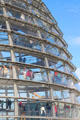 Visitors walk spiral within German Bundestag dome. Berlin, Germany.