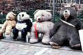 Stuffed plush bears on city sidewalk. Berlin, Germany.