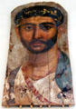 Mummy portrait of young soldier with sword belt from Fayum, Egypt at Altes Museum. Berlin, Germany.