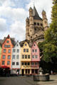 Restored historic Fischmarkt area with Great St Martin Romanesque church beyond. Köln, Germany.