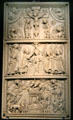 Ivory relief panel with Jesus' birth, baptism in the River Jordan & crucifixion of Christ at Aachen Cathedral Treasury. Aachen, Germany.