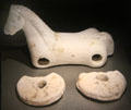 Ceramic miniature horse wheeled pull toy at New Aachen City Museum. Aachen, Germany.