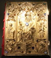 Ornate Imperial Gospel Book with symbols of the four evangelists in corners of the cover at New Aachen City Museum. Aachen, Germany.
