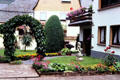 Flowers & plantings in front garden of dwelling. Pünderich, Germany.