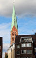 St Mary's Church steeple over market building. Lübeck, Germany.