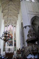 Stained glass beyond pulpit at St Mary's Church. Rostock, Germany.