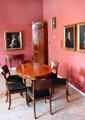 Biedermeier dining table & chairs with portraits at Schleswig Holstein State Museum. Schleswig, Germany.