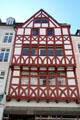 Half-timbered building with shop at ground level. Trier, Germany.