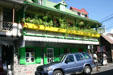Green & yellow bakery building. Roseau, Dominica.