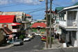 Looking down Cross Street to King George V Street part of finest concentration of vernacular architecture in Caribbean. Roseau, Dominica.