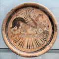 Greek terracotta plate with winged Sphinx from Eastern Greece at Antikensammlungen. Munich, Germany
