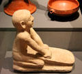 Figure of servant grinding flour of Limestone at Museum Ägyptischer Kunst. Munich, Germany.