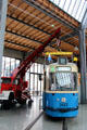 Munich Municipal Tramway car type M4.65 being positioned by crane truck F Magirus 250 D25A at Deutsches Museum Transport Museum. Munich, Germany.