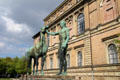 The Horse Tamer bronze sculpture by Herrmann Hahn damaged in WW II beside Alte Pinakothek. Munich, Germany