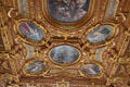 Paintings in gilded oval frames on ceiling in Goldener Saal at Augsburg Rathaus. Augsburg, Germany.