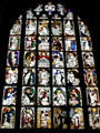 Stained glass window with religious scenes at St Lawrence Church. Nuremberg, Germany.
