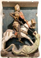 St George Slaying the Dragon sandstone house sign from Nuremberg at Germanisches Nationalmuseum. Nuremberg, Germany.