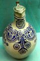 Stoneware flask with pewter cover & blue pattern from Westerwald at Germanisches Nationalmuseum. Nuremberg, Germany.