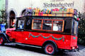 Antique bus decorated for town's Christmas Market. Rothenburg ob der Tauber, Germany