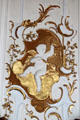 Baroque detail of cherub sitting on cloud holding moon in Goldener Saal at Academy for teacher training. Dillingen, Germany.