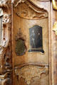 Detail of confessional with painting of skeleton holding skull at Ettal Benedictine Abbey. Ettal village, Germany.