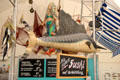 Ornate mermaid on sign for fish seller's shop. Füssen, Germany.