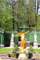 Golden angel fountain on grounds of Linderhof Castle. Ettal, Germany.