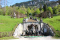 Neptune Fountain with lime pergolas & steps for cascade above at Linderhof Castle. Ettal, Germany.