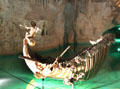 Shell-shaped boat with cupid on prow in Venus Grotto at Linderhof Castle. Ettal, Germany.