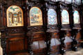 Richly carved choir stalls with paintings in St Lorenz Basilica. Kempten, Germany.