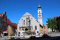 St Stephan's Church on Market Square with cast iron statue of Neptune with trident & dolphin. Lindau im Bodensee, Germany.