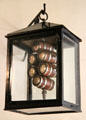 Square lamp with stack of mini-beer-barrels insert at Lindau Municipal Museum. Lindau im Bodensee, Germany.