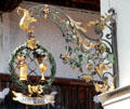 Elaborate wrought iron & gilded sign advertising wine & beer bar. Oberammergau, Germany.