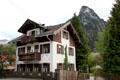 Traditional style building below foothills of Ammergau. Oberammergau, Germany.