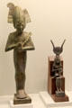 Bronze statues of Egyptian Gods Osiris & Isis with her son Horus on her knees at Museum of Bread and Art. Ulm, Germany.