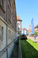 Outer wall of Ulm Federal Fortress now Danube Schwabian Museum with antique boat on lawn. Ulm, Germany.